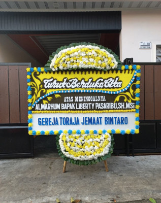 Papan Bunga Duka di Tua Tunu